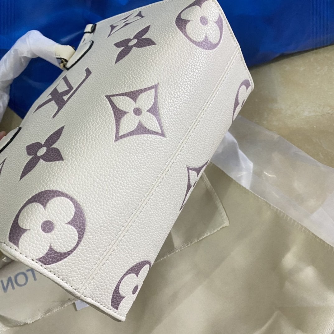 LOUIS VUITTON ONTHEGO PM 25 CREAM EMBOSSED GRAINED COWHIDE LEATHER