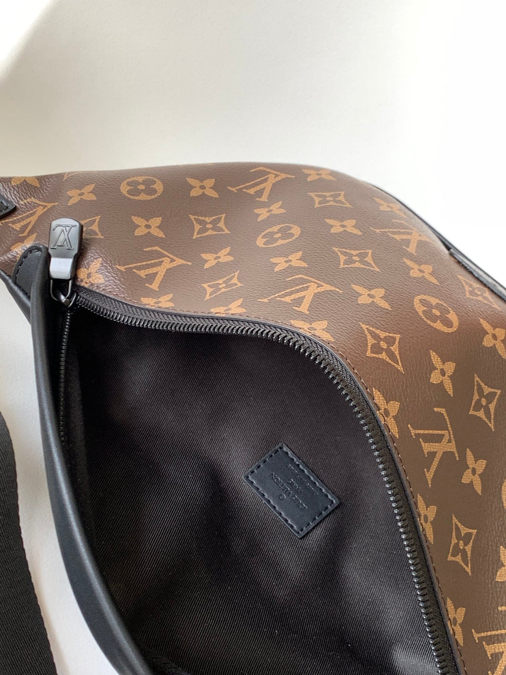 LOUIS VUITTON LV 25S DISCOVERY BUMBAG 47 IN BROWN AND BLACK EMBOSSED MONOGRAM ECLIPSE CALFSKIN