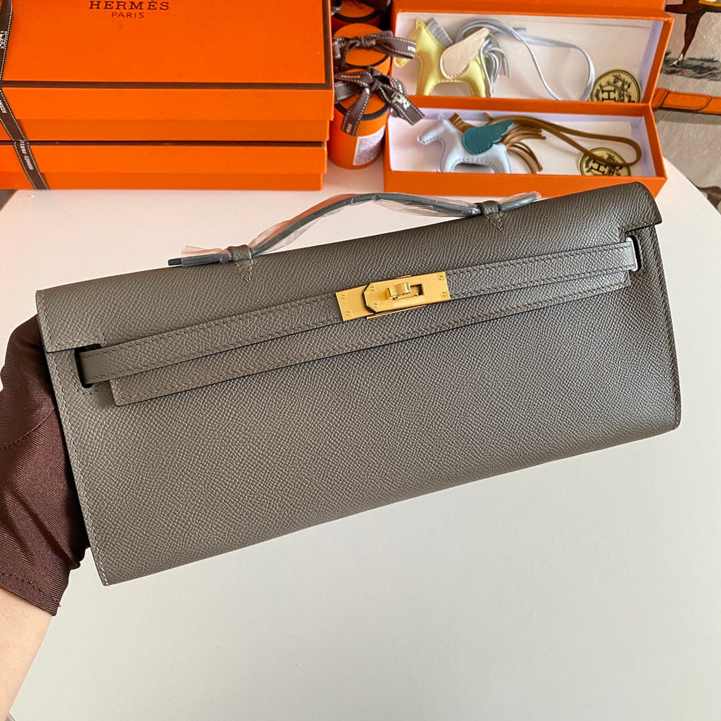 HERMES KELLY CUT 31 IN WOOD BROWN CALFSKIN WITH GOLD HARDWARE