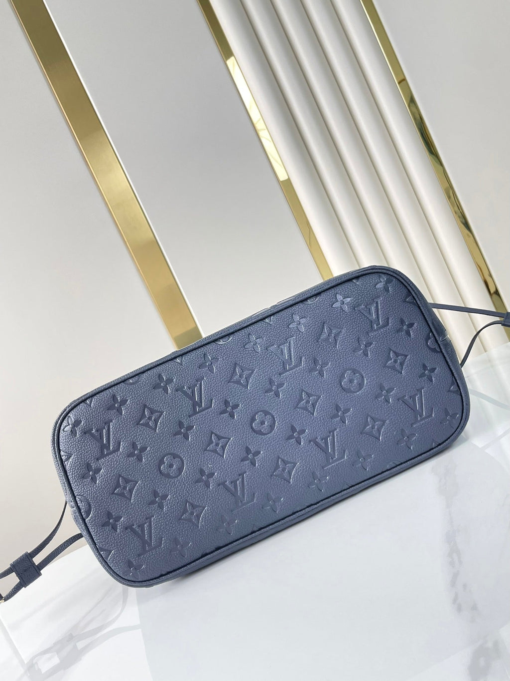 LOUIS VUITTON NEVERFULL MM 31 IN DARK NAVY MONOGRAM EMPREINTE LEATHER