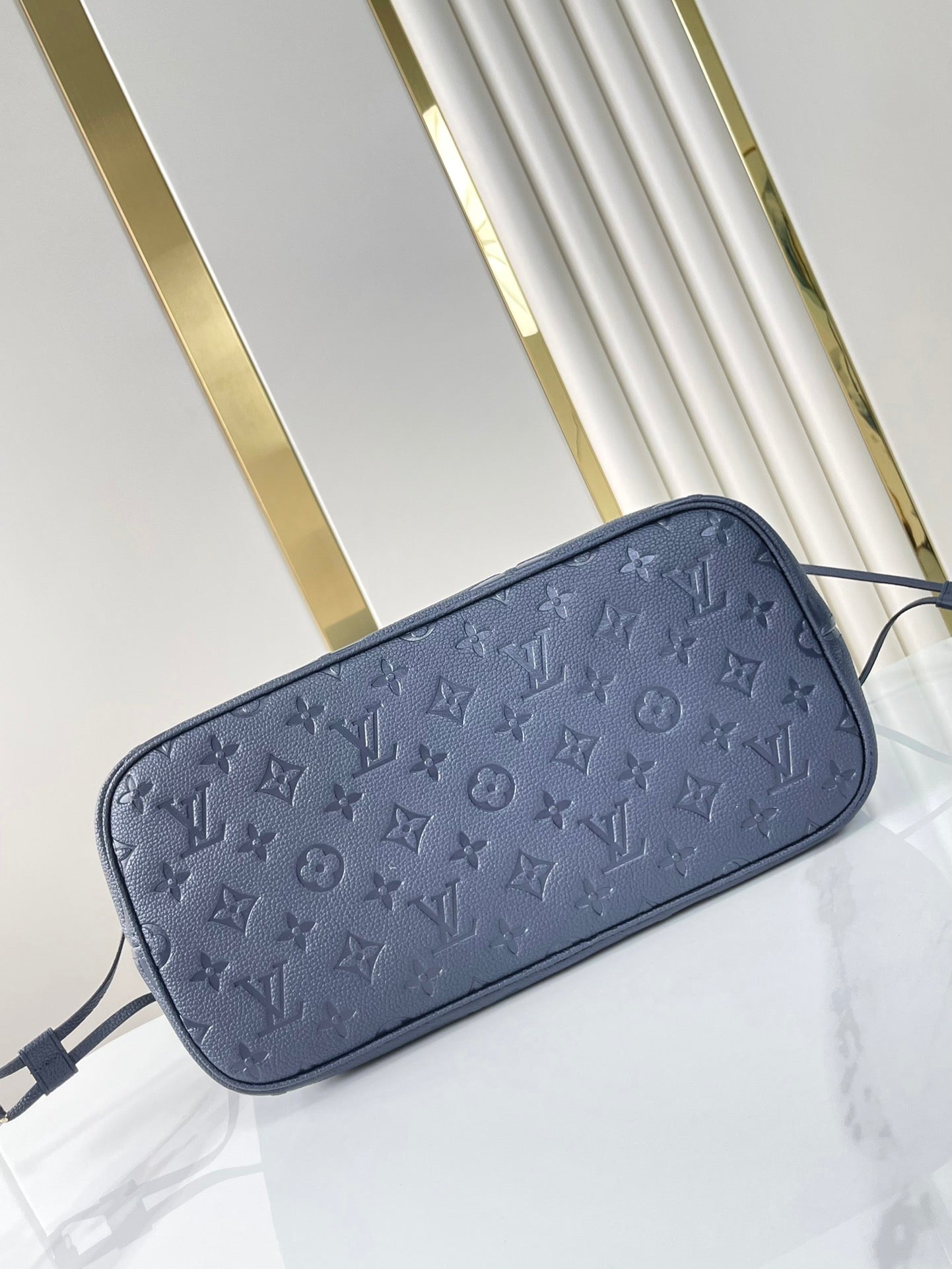 LOUIS VUITTON NEVERFULL MM 31 IN DARK NAVY MONOGRAM EMPREINTE LEATHER