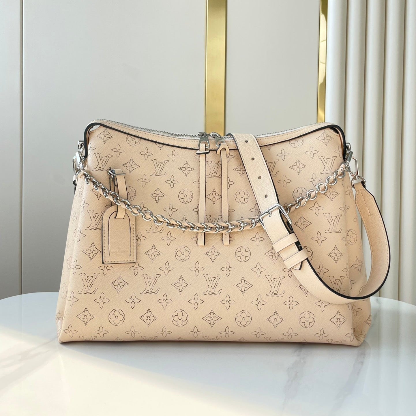 LOUIS VUITTON HAND IT ALL MM 32 IN CREAM MONOGRAM PERFORATE CALFSKIN SILVER HARDWARE
