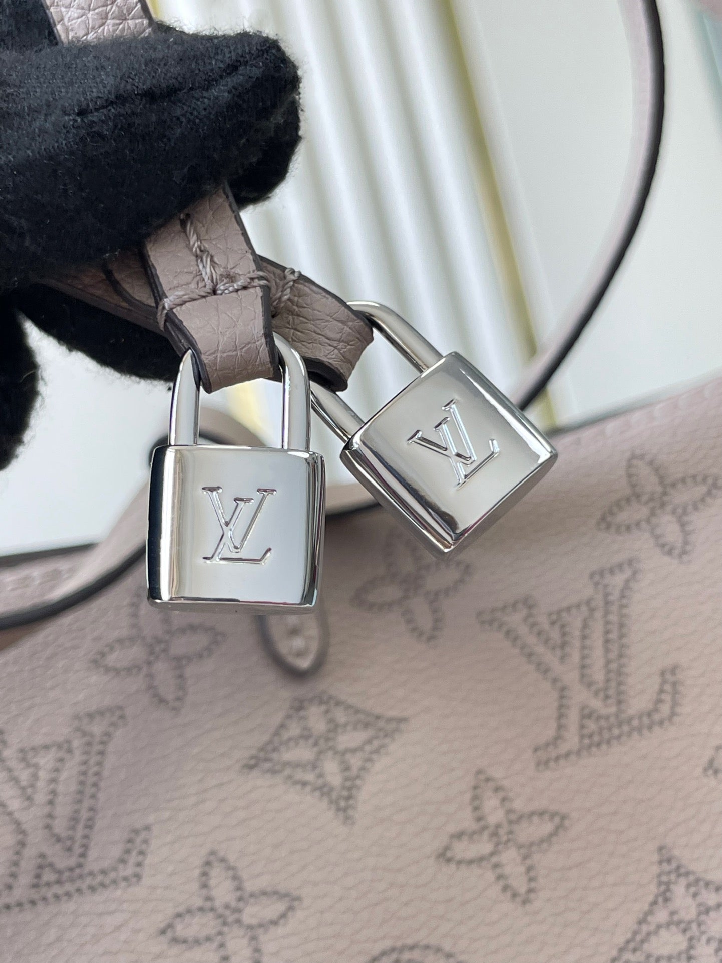 LOUIS VUITTON FLORE 28 IN GALET PERFORATED CALFSKIN