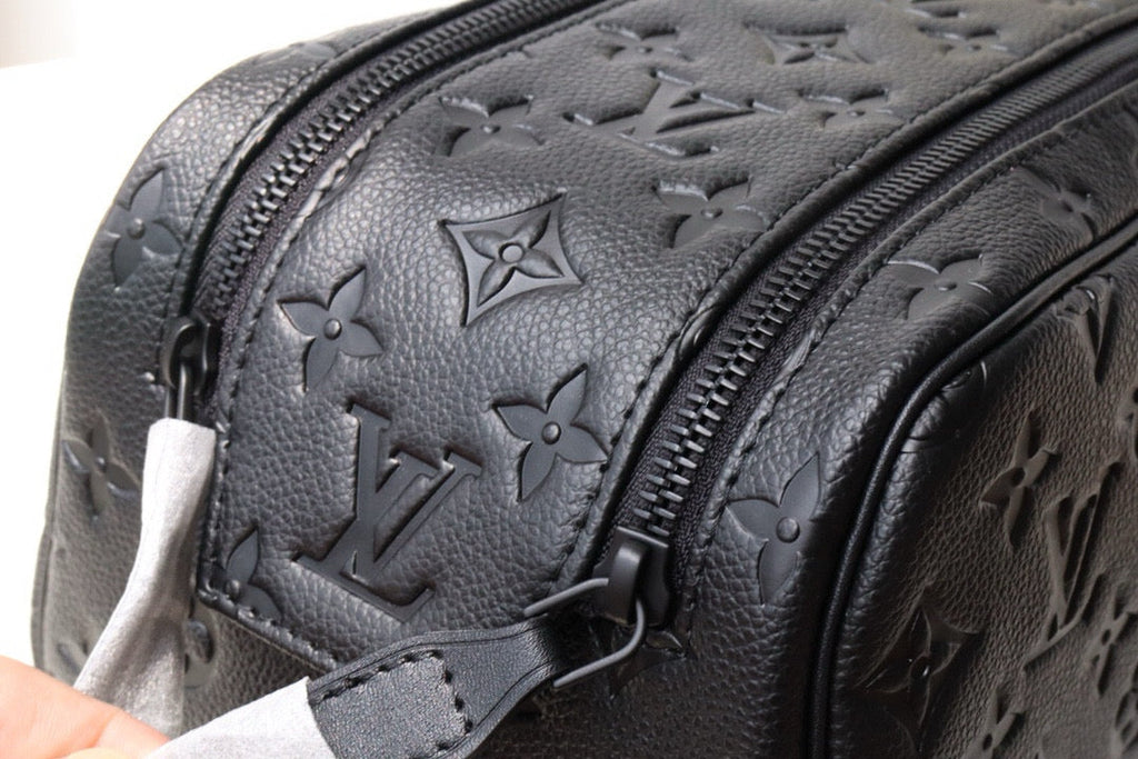 LOUIS VUITTON DOPP KIT TOILETRY BAG 28 CM IN BLACK TAURILLON MONOGRAM LEATHER