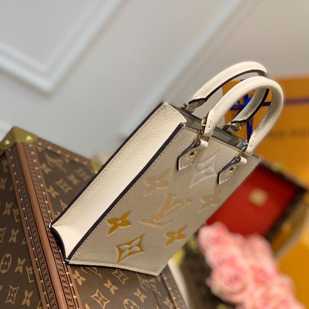 LOUIS VUITTON LV PETIT SAC PLAT CREAM MONOGRAM EMPREINTE COWHIDE LEATHER