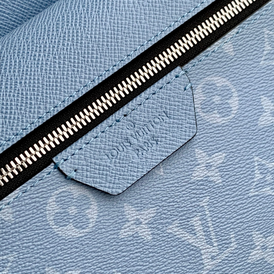 LOUIS VUITTON DISCOVERY SLIM BACKPACK 38 BLUE MONOGRAM COATED CANVAS AND CALFSKIN