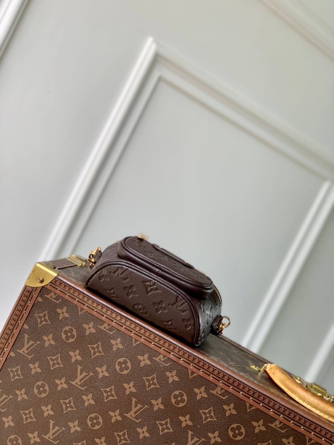 LOUIS VUITTON MINI BUMBAG 17 IN DARK BROWN MONOGRAM EMBOSSED LOGO CALFSKIN