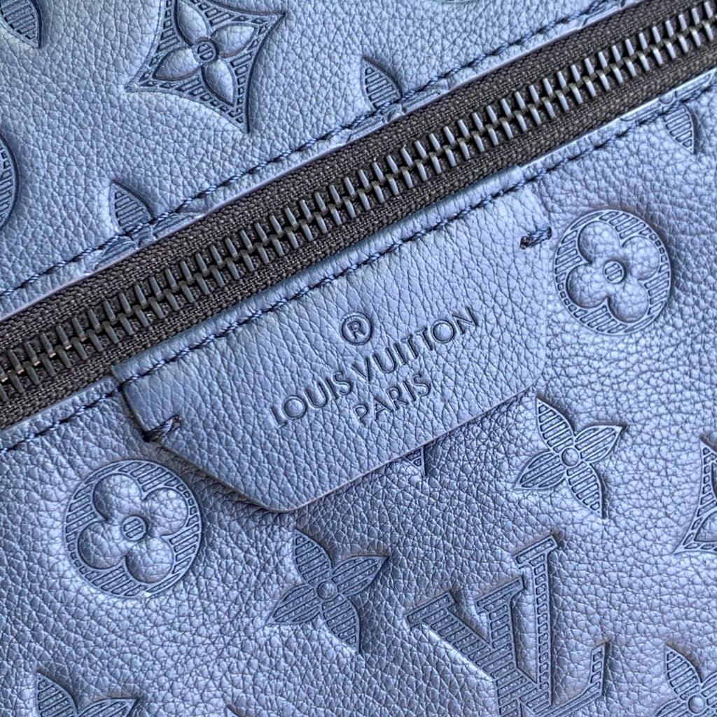 LOUIS VUITTON DISCOVERY PM BACKPACK 38 IN NAVY BLUE LAMBSKIN EMBOSSED MONOGRAM LOGO