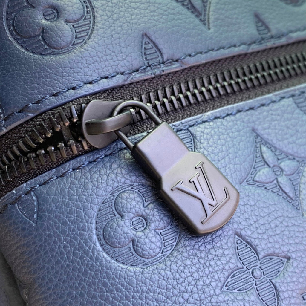 LOUIS VUITTON DISCOVERY PM BACKPACK 38 IN NAVY BLUE LAMBSKIN EMBOSSED MONOGRAM LOGO