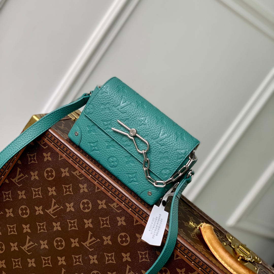 LOUIS VUITTON STEAMER WEARABLE WALLET 18 IN TEAL GREEN MONOGRAM TAURILLON CALFSKIN