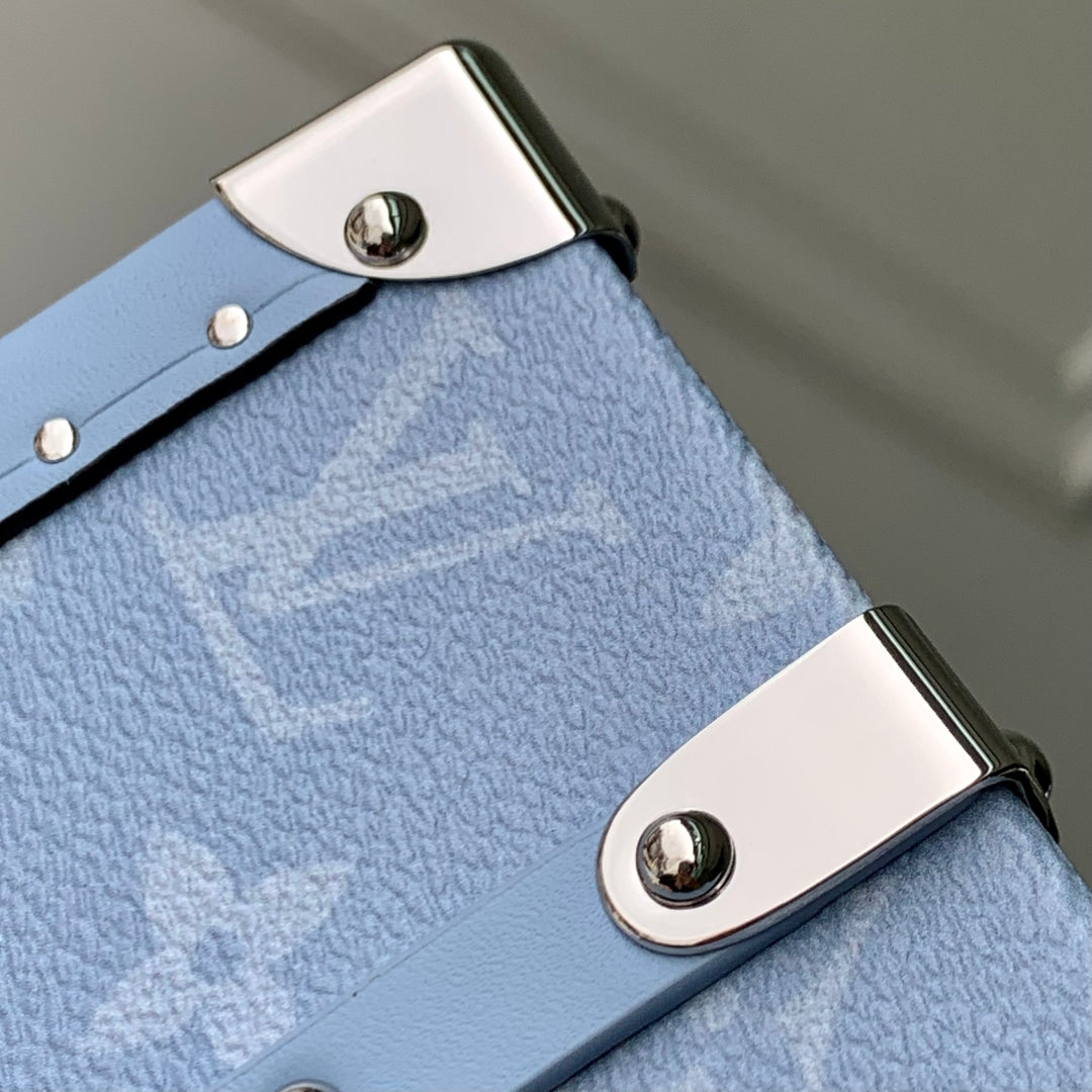 LOUIS VUITTON WALLET TRUNK TAIGARAMA 21.5 IN BLUE MONOGRAM COATED CANVAS
