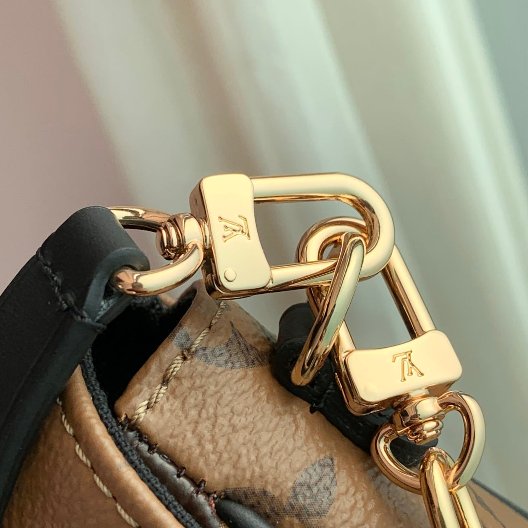 LOUIS VUITTON WALLET ON CHAIN IVY 23 IN BROWN MONOGRAM REVERSE CANVAS