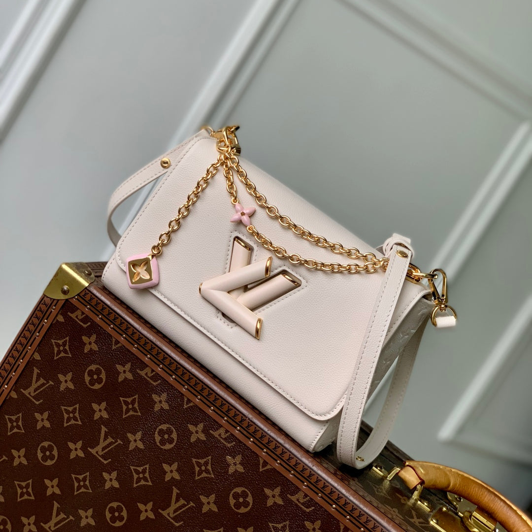 LOUIS VUITTON TWIST SLIM 19 IN LIGHT PINK TAURILLON CALFSKIN GOLD HARDWARE