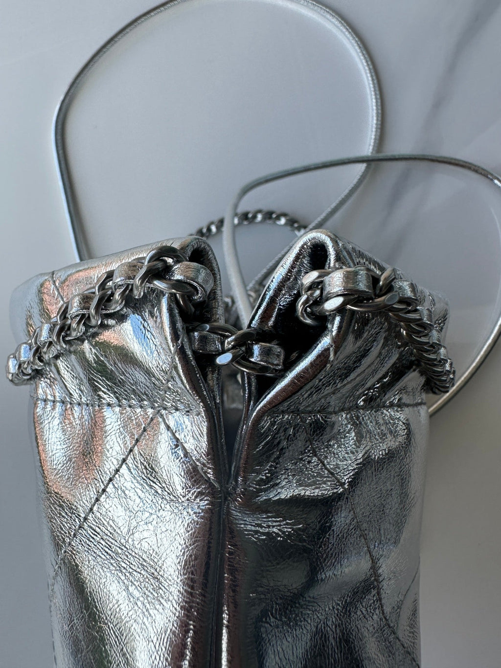 CHANEL MINI 20 BAG IN SILVER METALLIC LAMBSKIN
