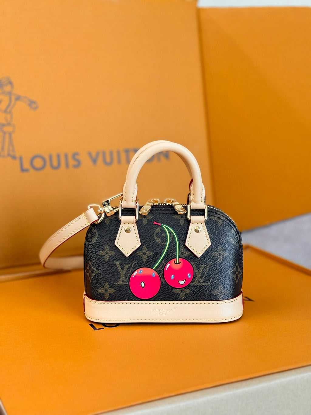 LOUIS VUITTON LV 25S NANO ALMA 18 IN DARK BROWN CANVAS MONOGRAM CHERRY PRINT GOLD HARDWARE