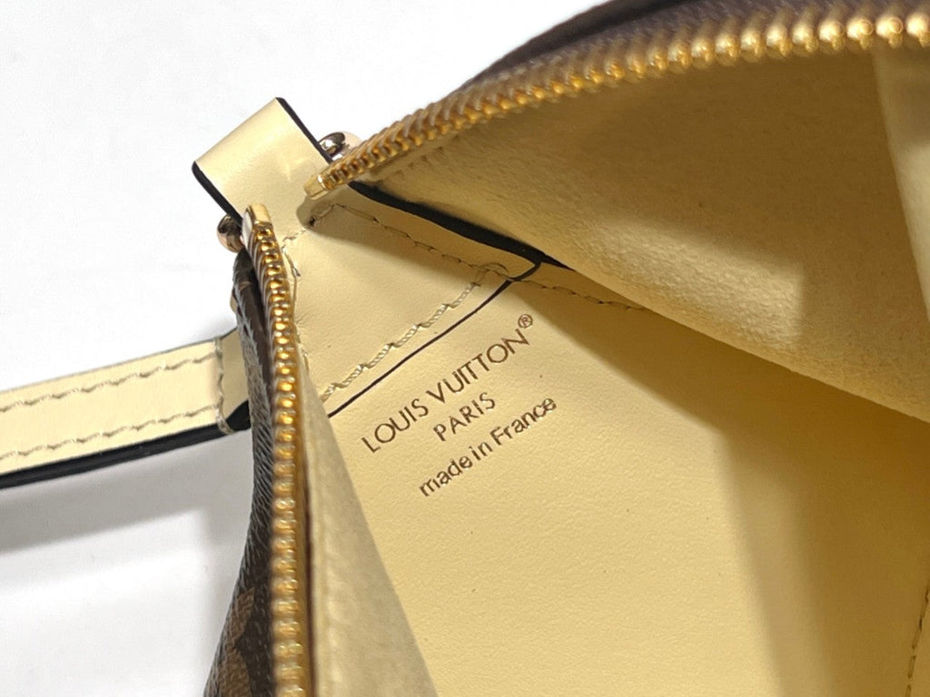 LOUIS VUITTON BLOOM POUCH 22 IN BROWN MONOGRAM CANVAS AND PASTEL YELLOW CALFSKIN SIDES