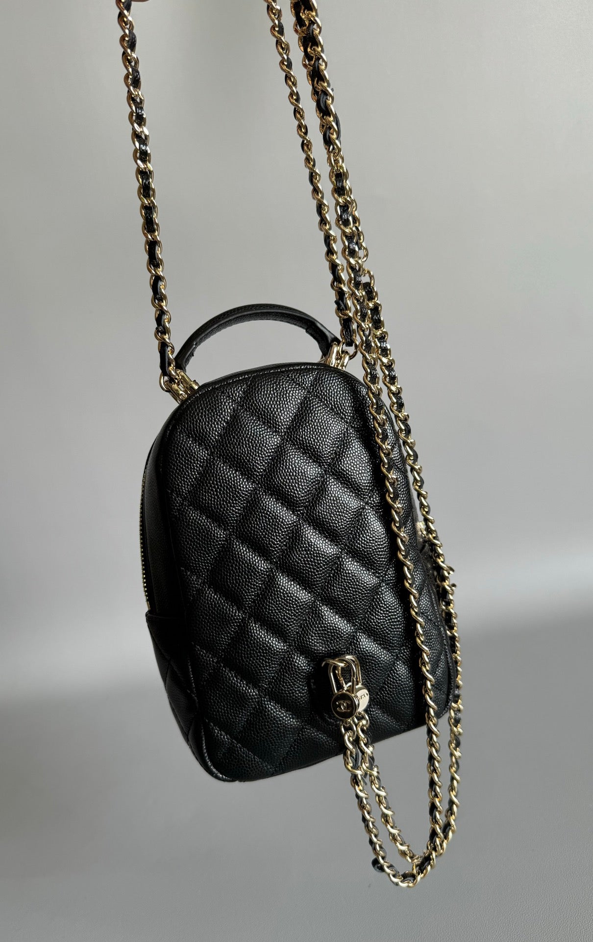 CHANEL MINI 18 BACKPACK BLACK CAVIAR LIGHT GOLD HARDWARE