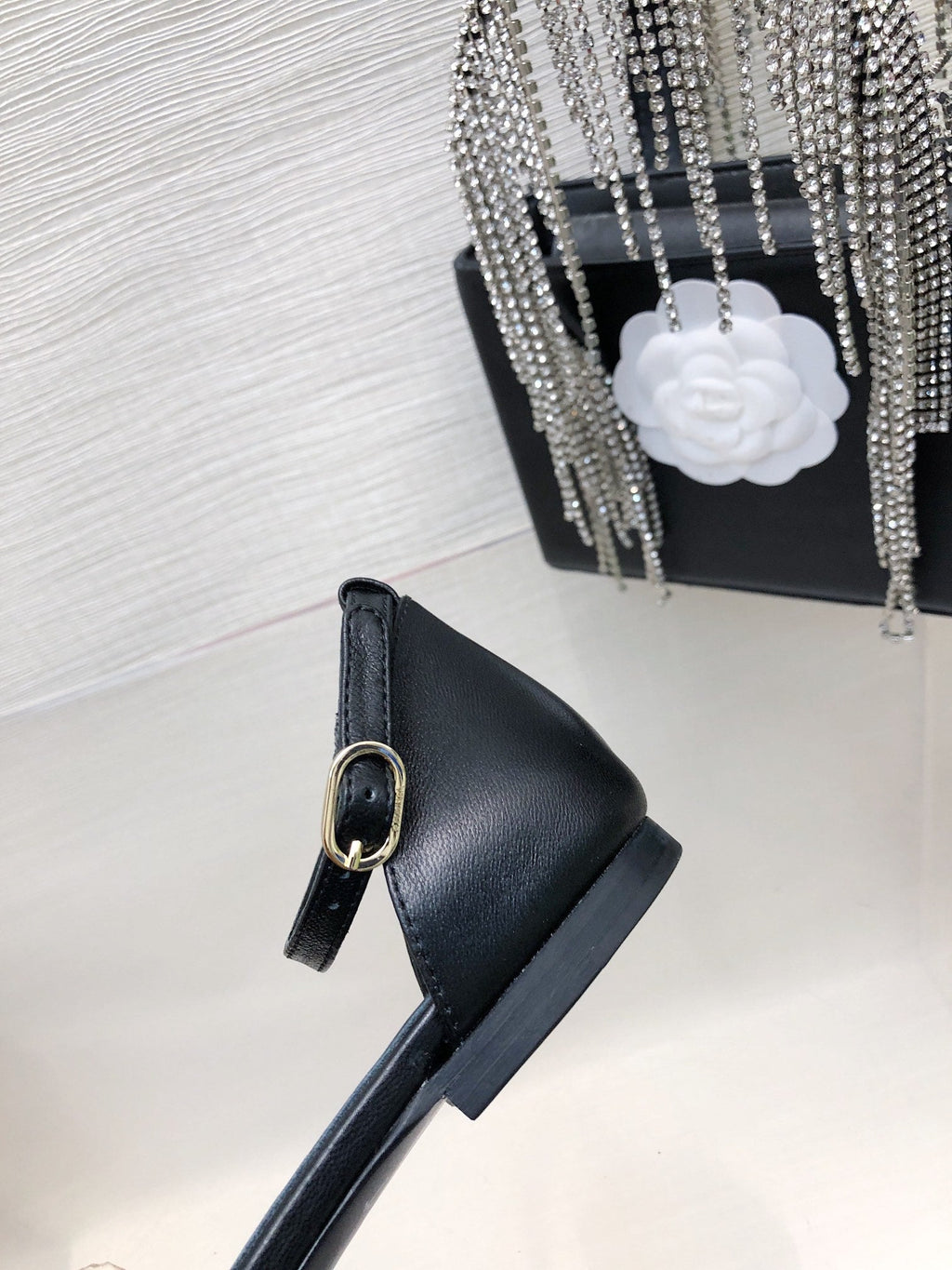CHANEL BLACK LAMBSKIN CAMELLIA HOLLOW SANDAL