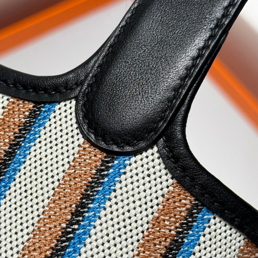 HERMES PICOTIN LOCK 18 BAG IN BLACK CALFSKIN ÉCRU/NOIR/FAUVE/NOIR/BLEU ZANZIBAR EMBROIDERY CANVAS