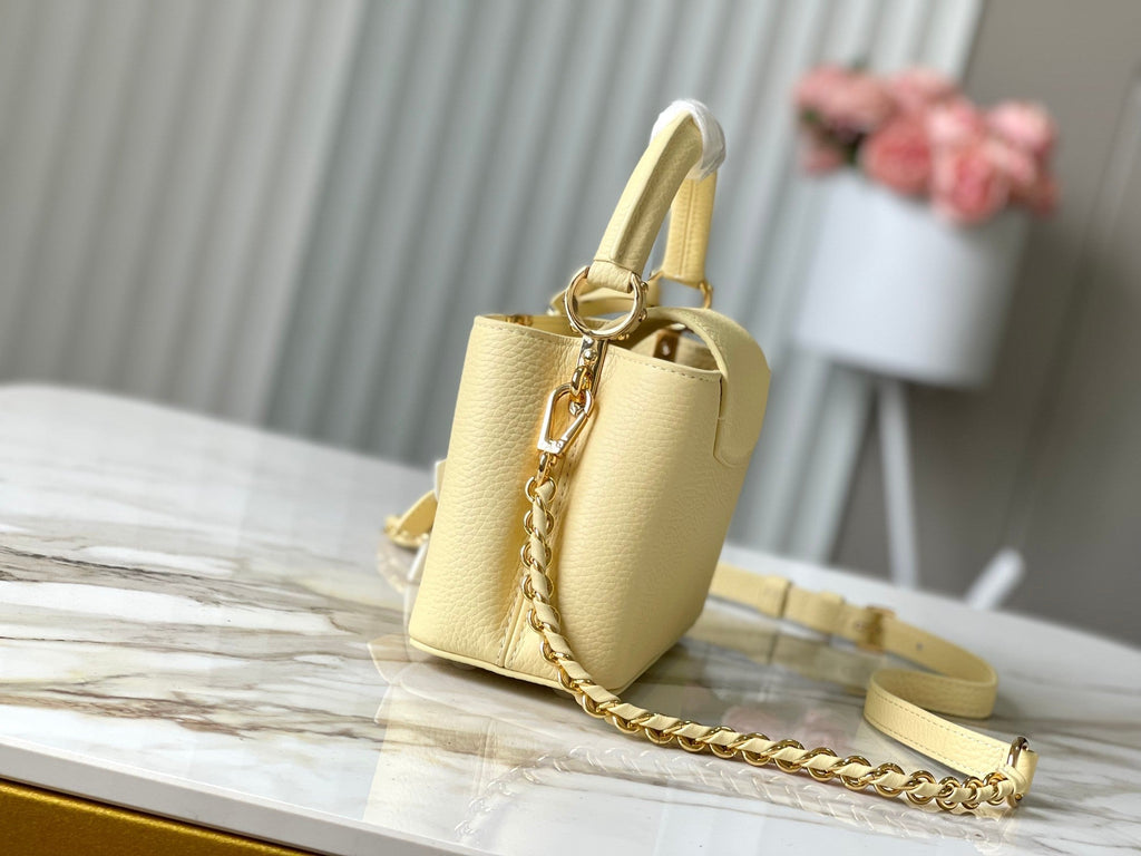 LOUIS VUITTON CAPUCINES EAST-WEST MINI 22 IN BANANA YELLOW TAURILLON GOLD HARDWARE