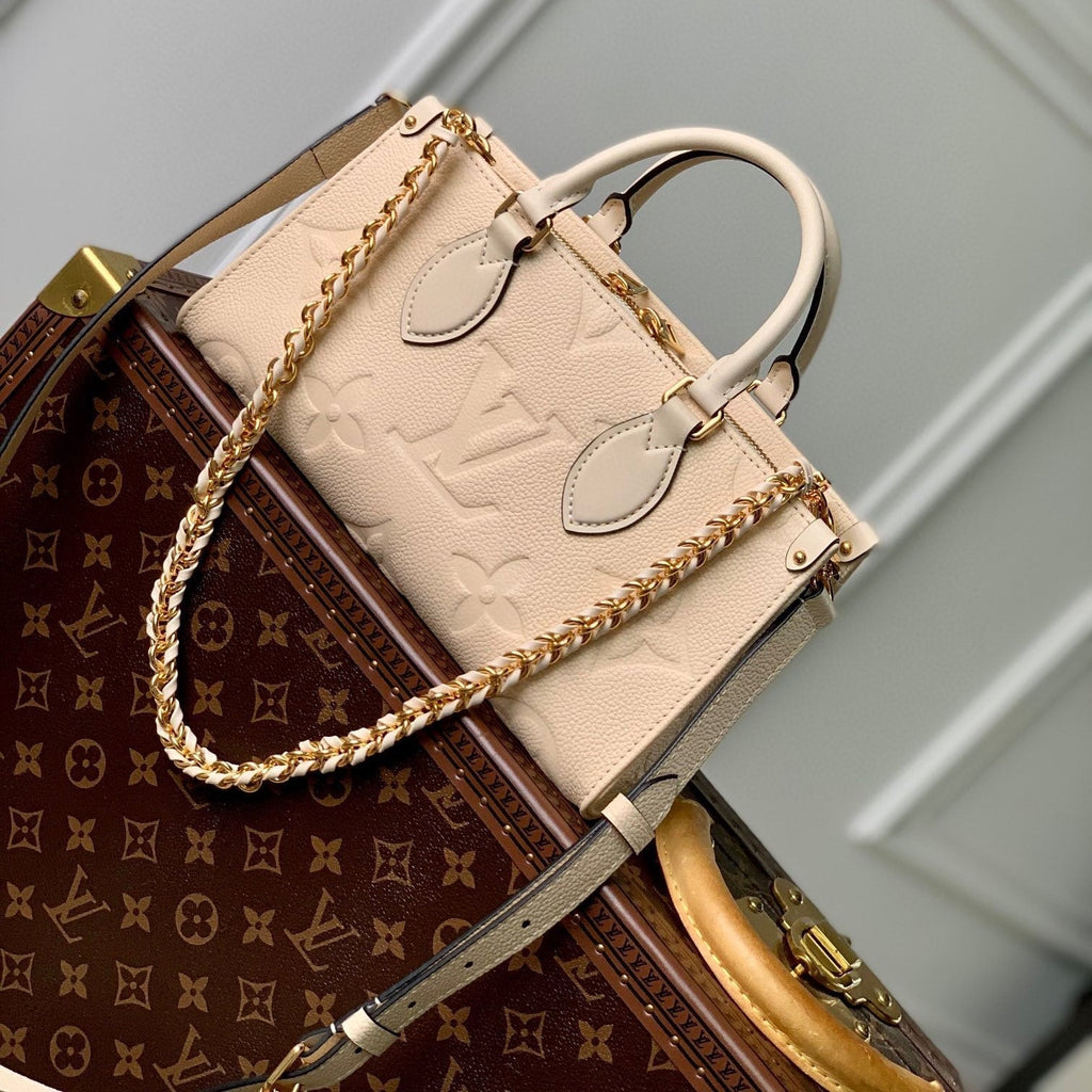 LOUIS VUITTON ONTHEGO EAST WEST BAG 25 IN BEIGE MONOGRAM EMBOSSED COWHIDE