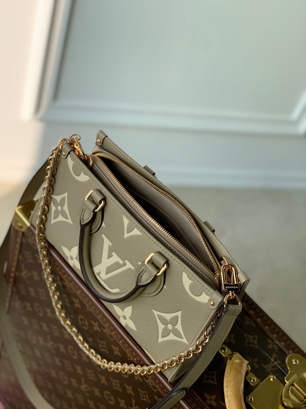 LOUIS VUITTON ONTHEGO EAST WEST BAG 25 IN GREEN MONOGRAM EMBOSSED COWHIDE