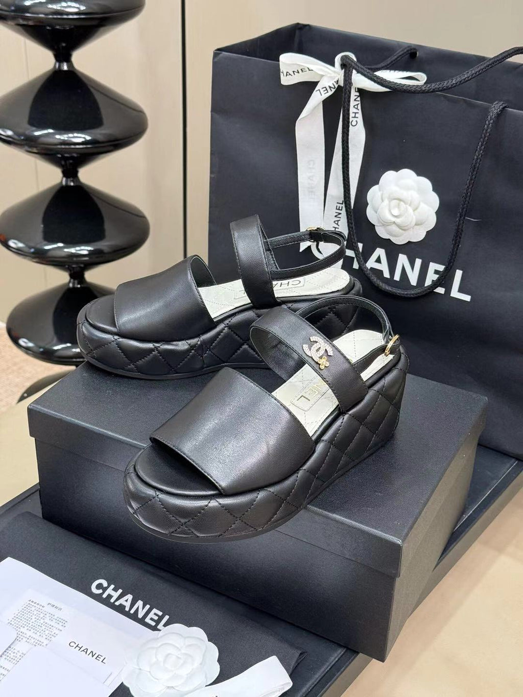 CHANEL HIGH WEDGE SANDALS IN BLACK LAMBSKIN