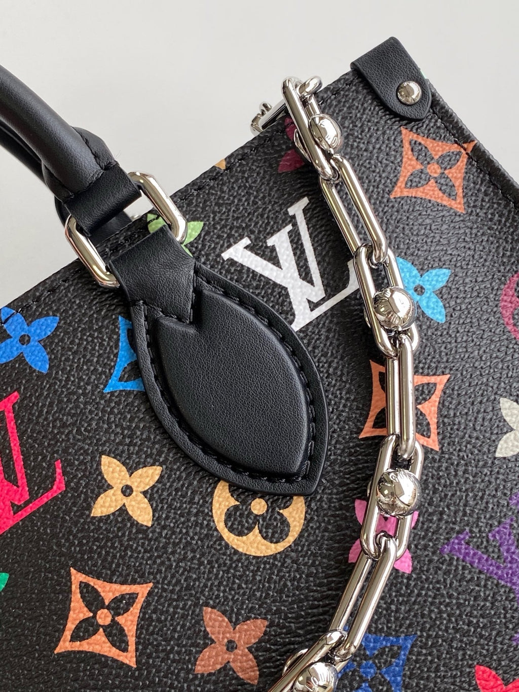 LOUIS VUITTON ONTHEGO EAST WEST BAG 25 IN COLORFUL MONOGRAM PATTERN CANVAS