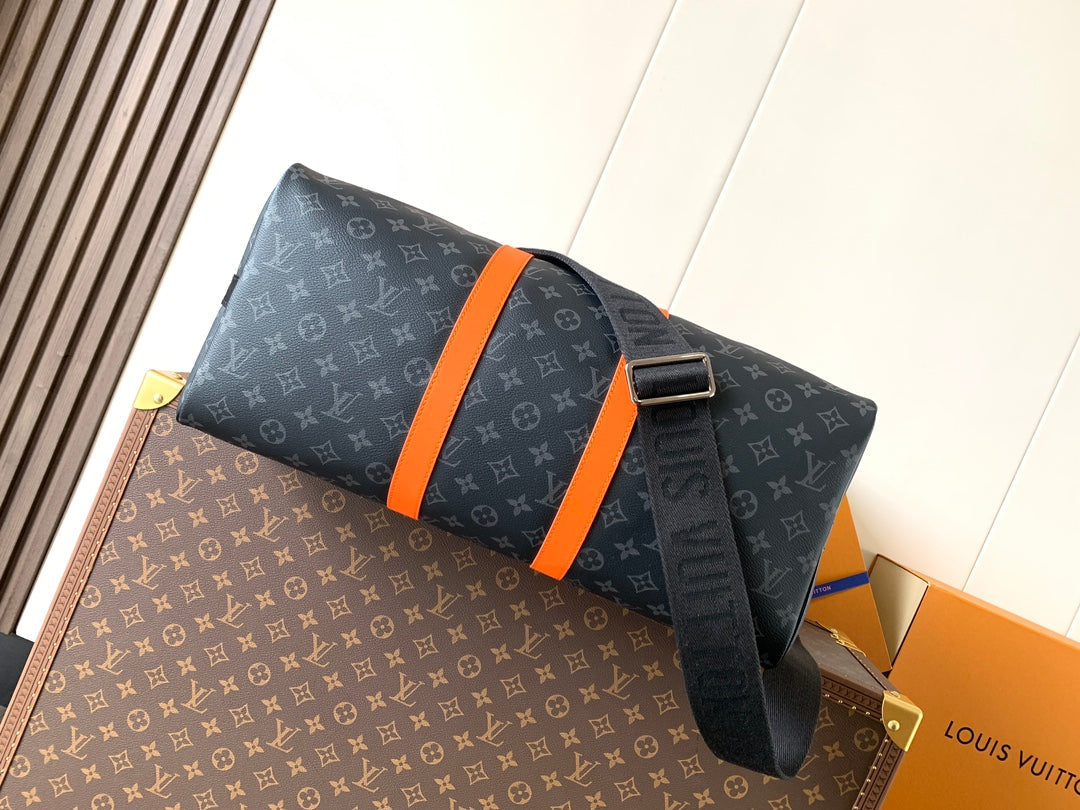 LOUIS VUITTON LV 25S KEEPALL 45 WITH SHOULDER STRAP IN BLACK ORANGE COATED MONOGRAM ECLIPSE CANVAS AND CALFSKIN