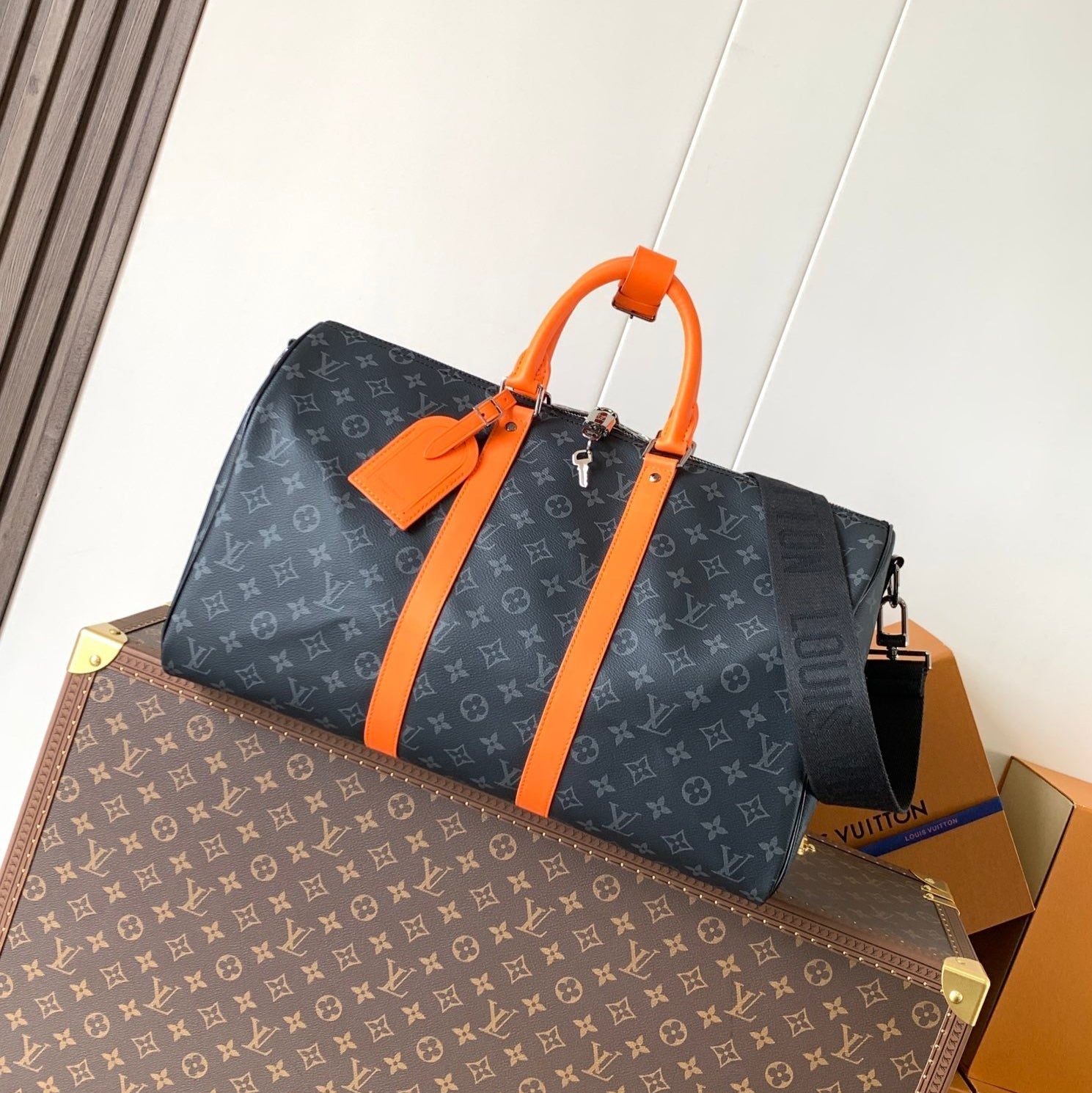 LOUIS VUITTON LV 25S KEEPALL 45 WITH SHOULDER STRAP IN BLACK ORANGE COATED MONOGRAM ECLIPSE CANVAS AND CALFSKIN