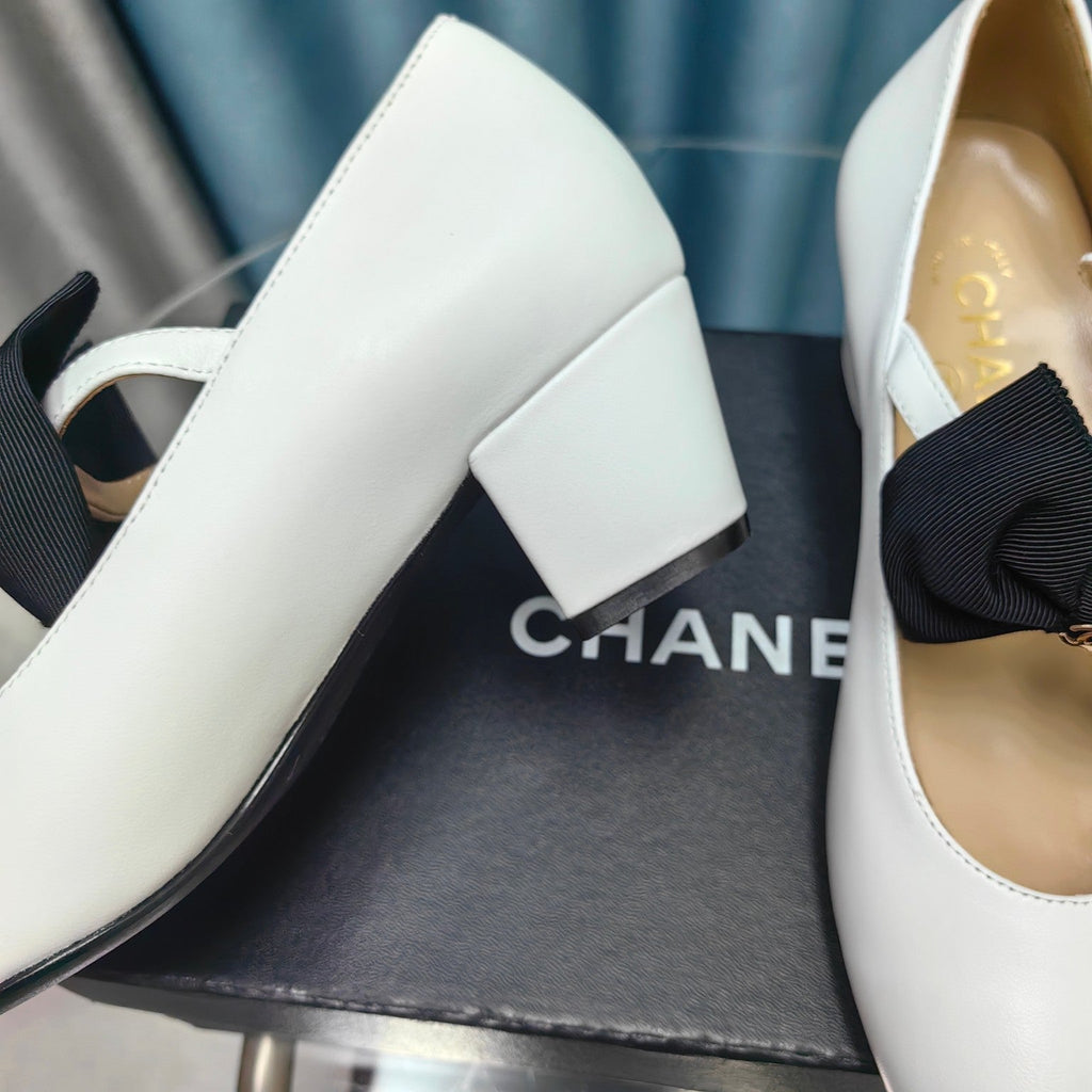 CHANEL HIGH MARY JANE SHOES WHITE SHEEPSKIN WITH BLACK BOW