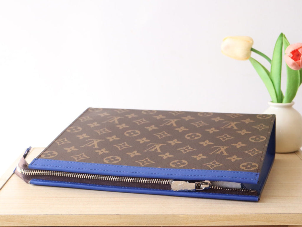 LOUIS VUITTON LV 25S POCHETTE VOYAGE 26 IN INDIGO BLUE MONOGRAM MACASSAR COATED CANVAS