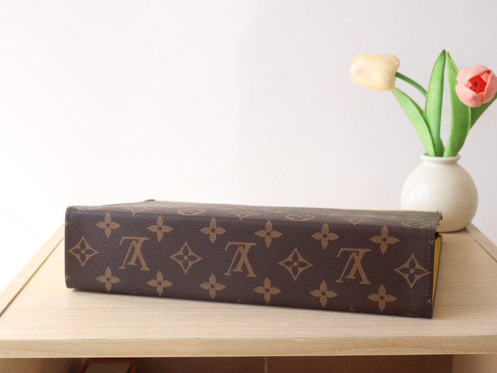 LOUIS VUITTON LV 25S POCHETTE VOYAGE 26 IN YELLOW MONOGRAM MACASSAR COATED CANVAS