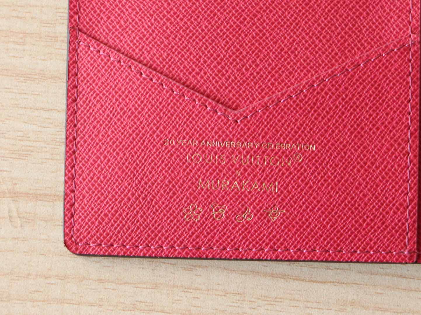 LOUIS VUITTON DOLL PASSPORT WALLET IN CHOCOLATE BROWN MONOGRAM CALFSKIN