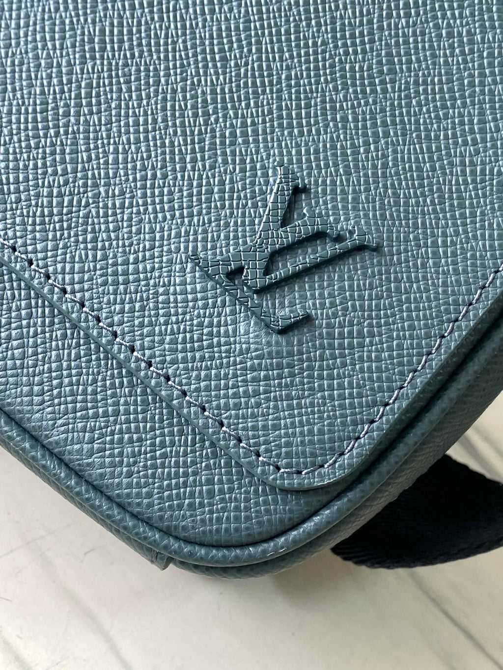 LOUIS VUITTON DISTRICT PM 26 IN CELESTE GREEN CALFSKIN