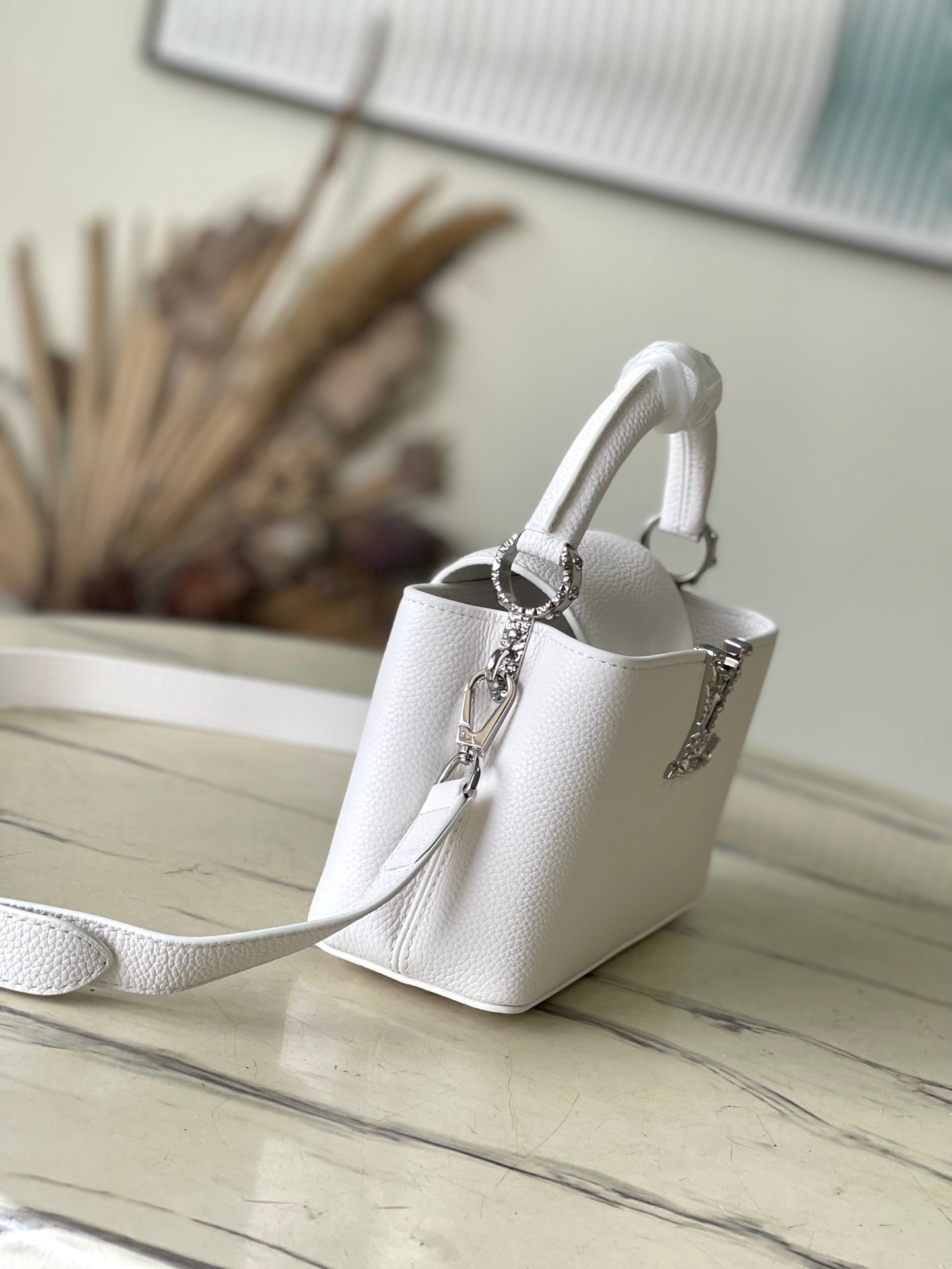 LOUIS VUITTON CAPUCINES EAST-WEST MINI 22 IN WHITE CALFSKIN SILVER HARDWARE