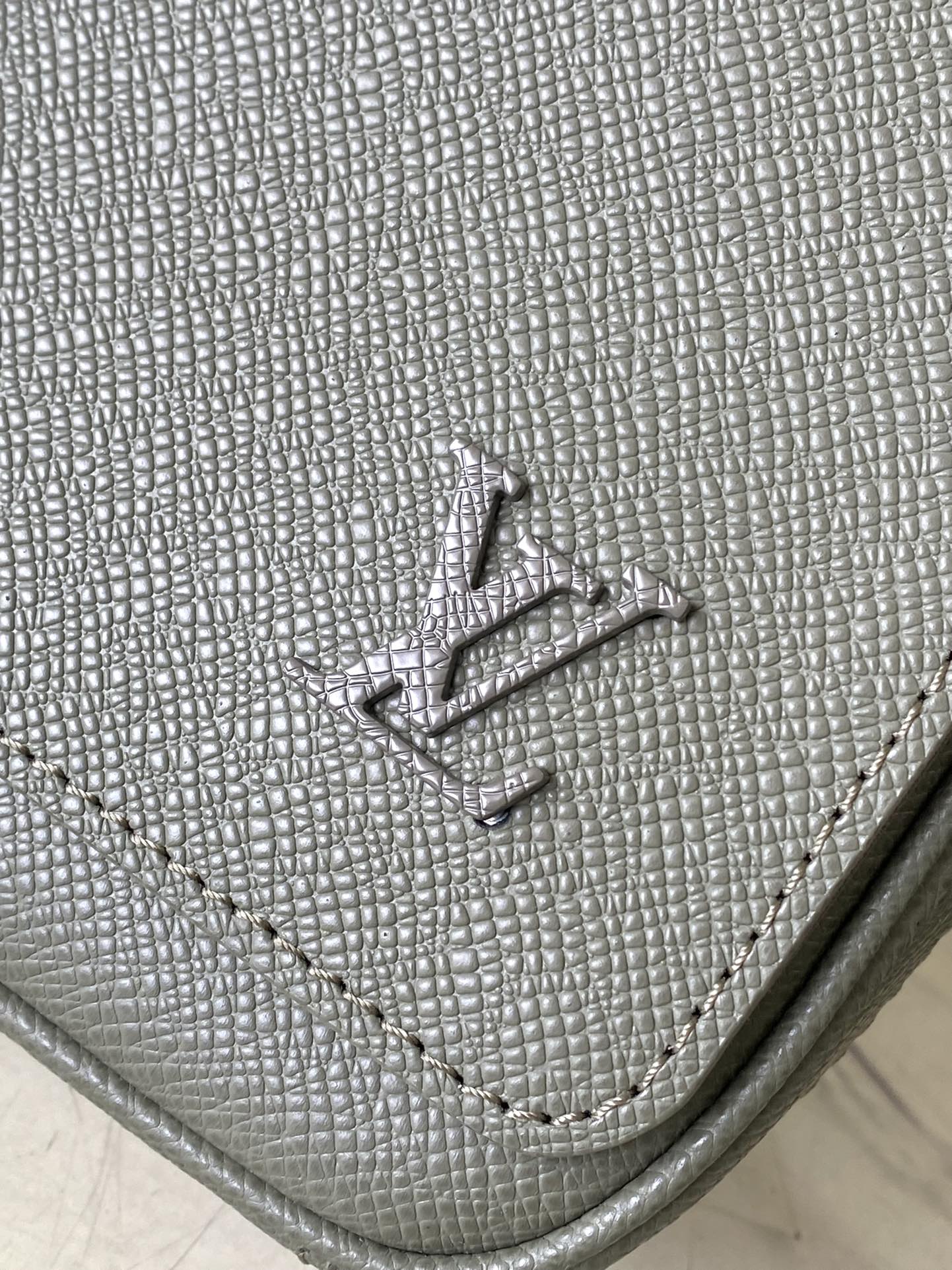 LOUIS VUITTON DISTRICT PM 26 IN KHAKI GREEN CALFSKIN