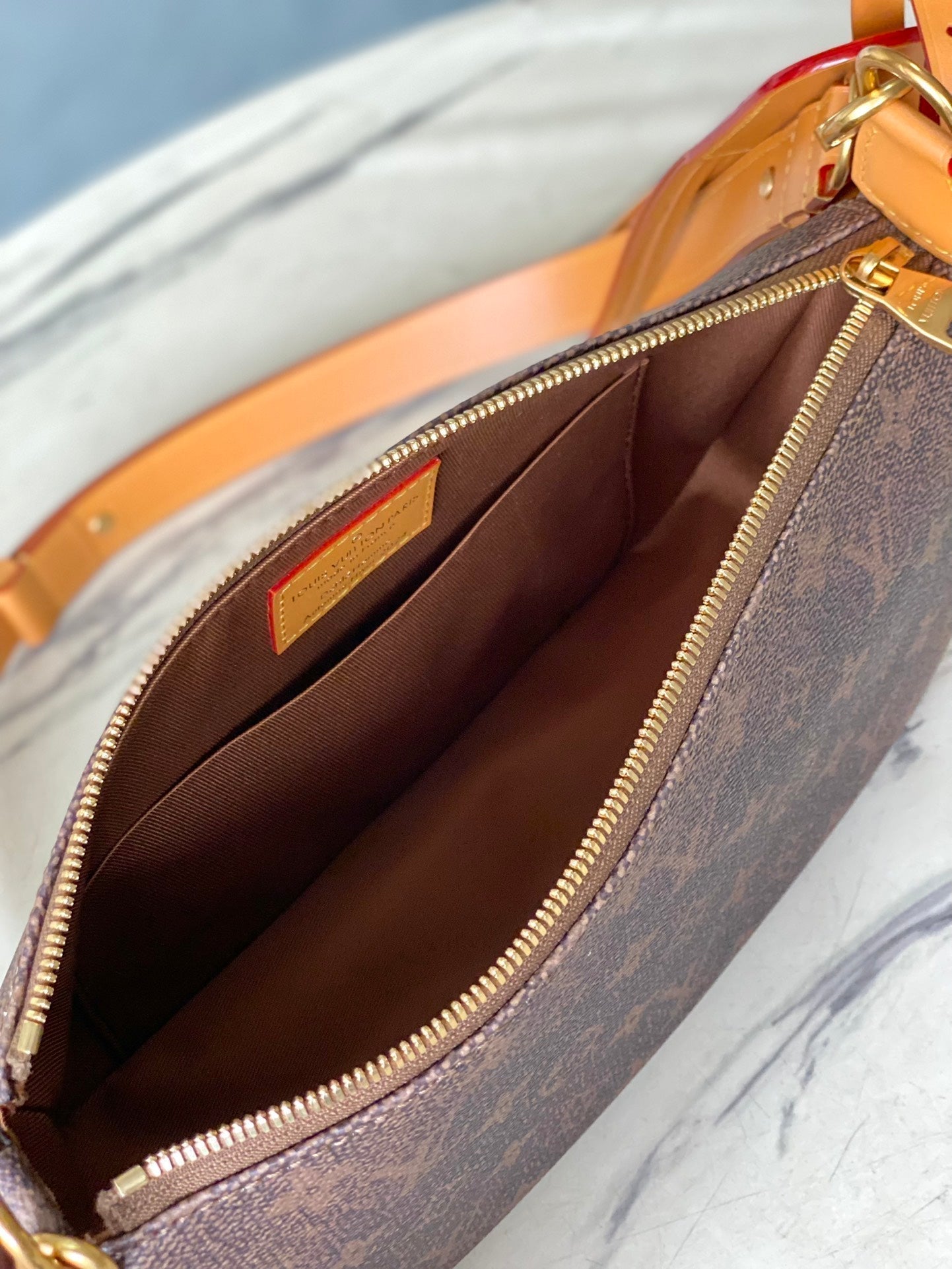 LOUIS VUITTON POCHETTE ACCESSOIRE XL 28 IN BROWN MONOGRAM DUST CANVAS