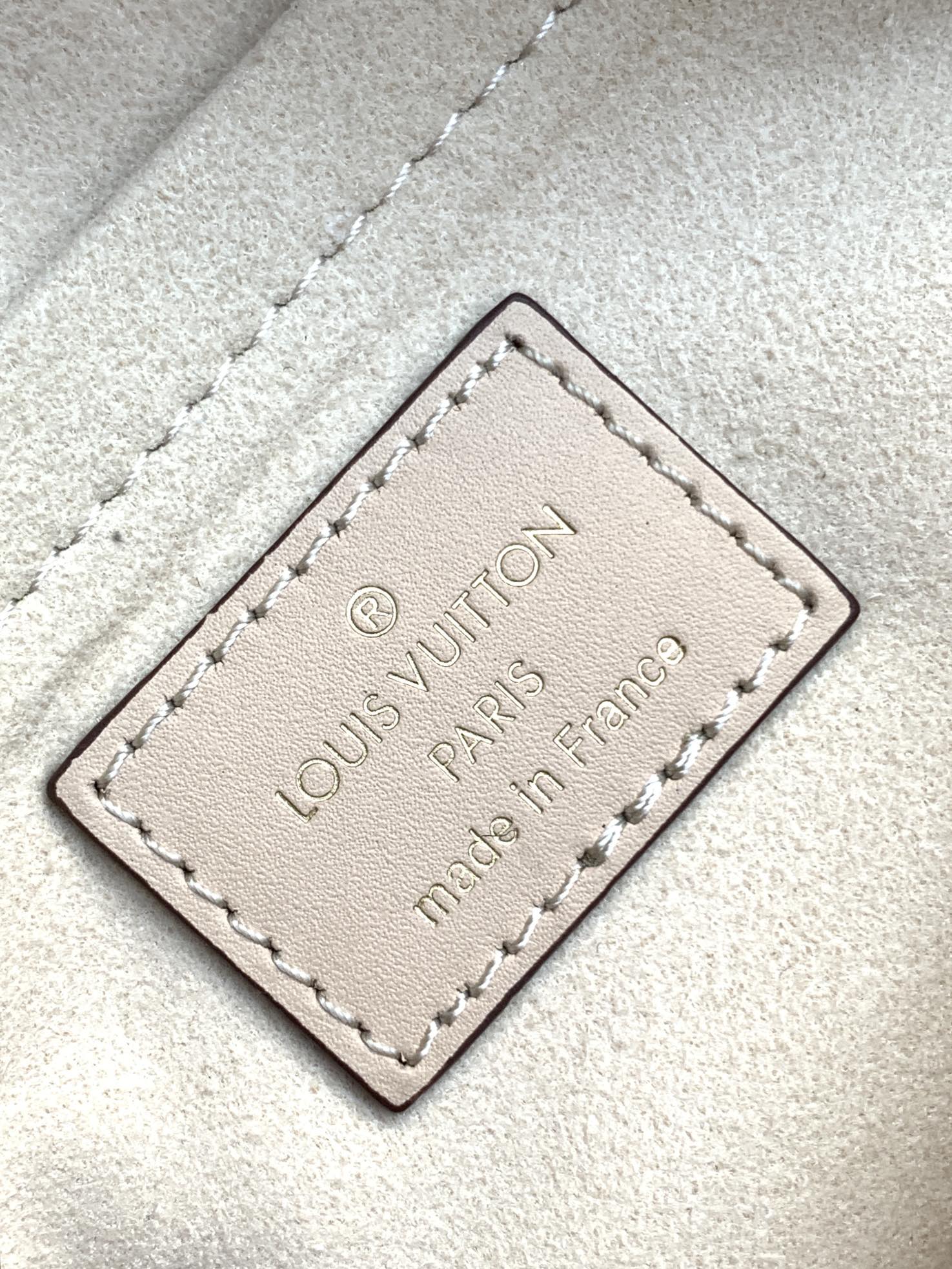 LOUIS VUITTON LV 25S ONTHEGO EAST WEST BAG 25 IN CREAM CALFSKIN MONOGRAM EMPREINTE