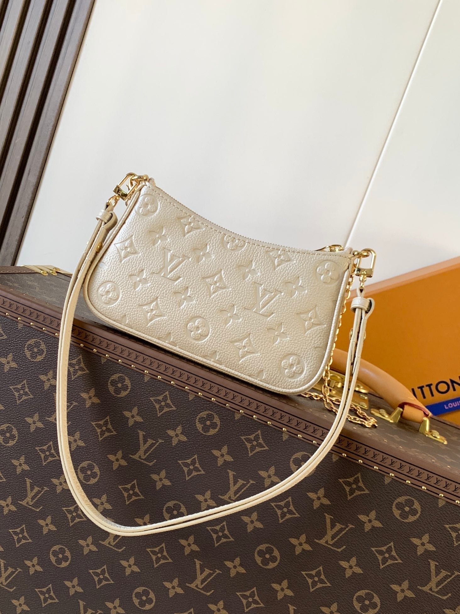 LOUIS VUITTON EASY POUCH ON STRAP 19 IN BEIGE MONOGRAM EMPREINTE LEATHER