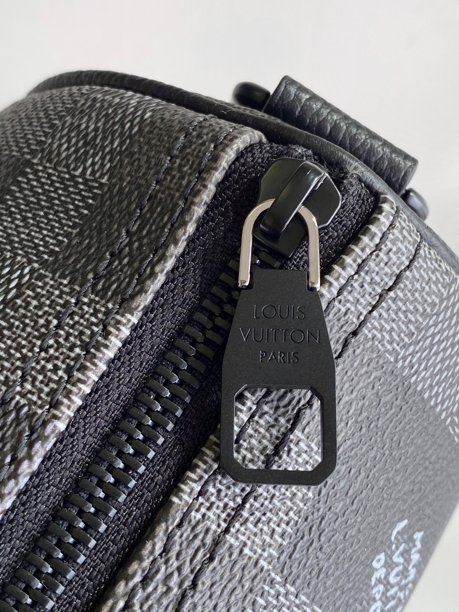LOUIS VUITTON LV 25S KEEPALL BANDOULIÈRE 25 BAG IN DAMOFLAGE BLACK CALFSKIN